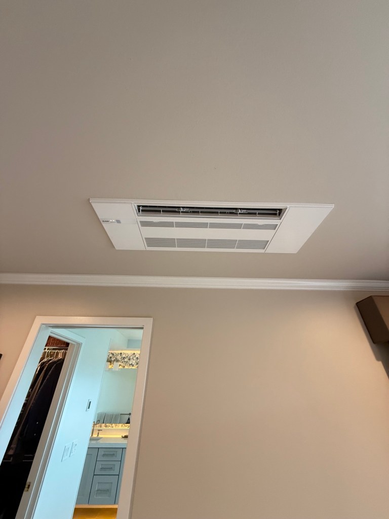 Ceiling cassette mini-split installed in a ceiling