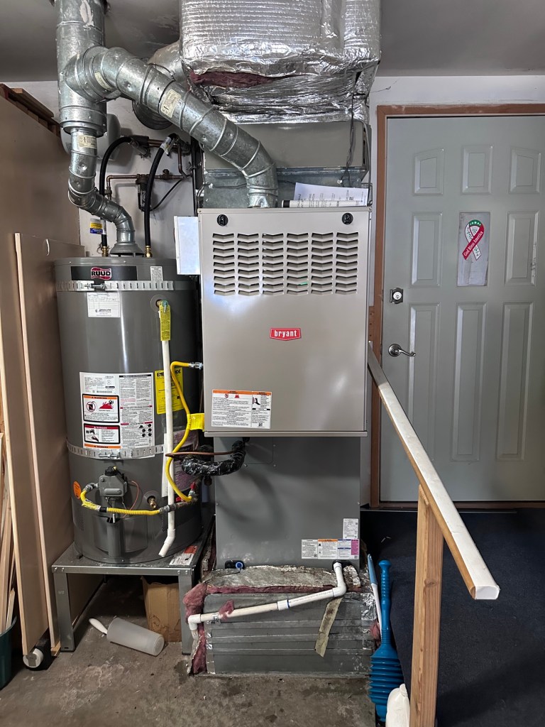 Bryant furnace installed next to a water heater