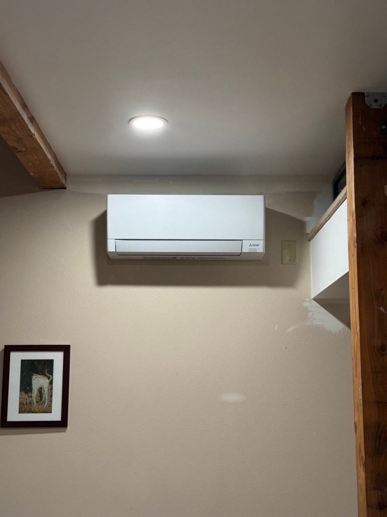 White Mitsubishi ductless mini-split wall unit
