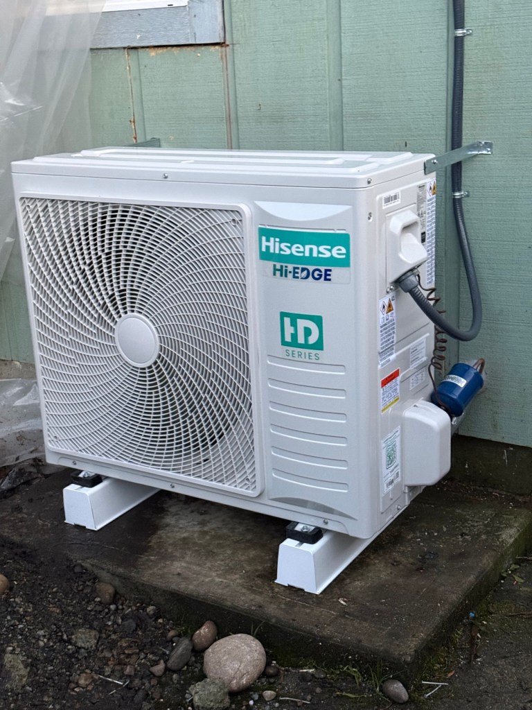 Lennox heat pump unit being cleaned