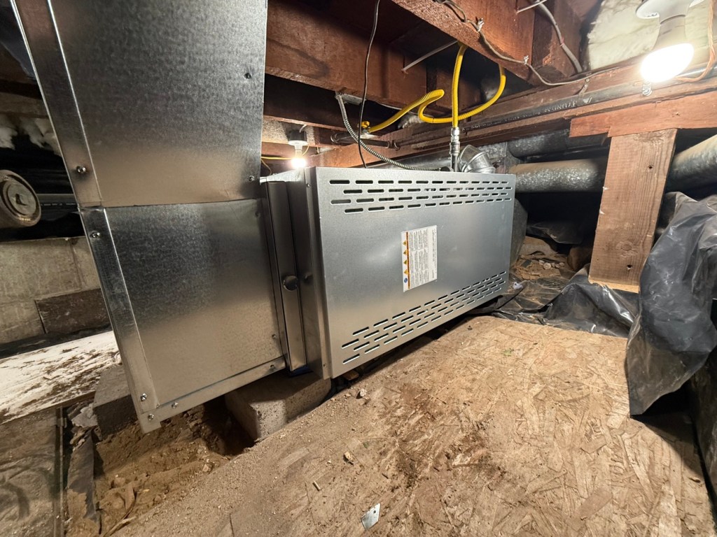 Horizontal furnace unit in a crawl space